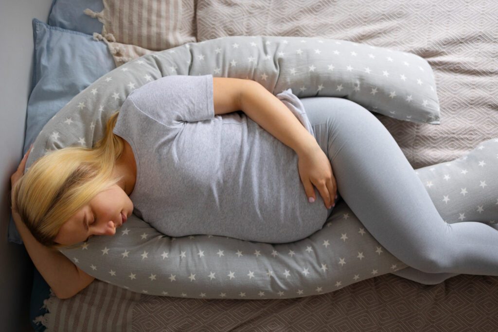 How to Sleep Better During Pregnancy: 9 Helpful Tips